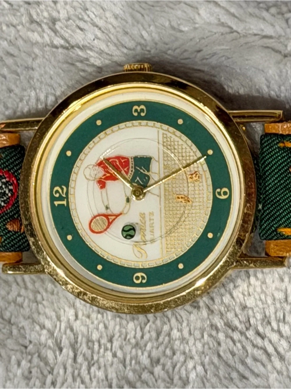 Tennis Motif Gold-Tone Watch with Green Dial Accents